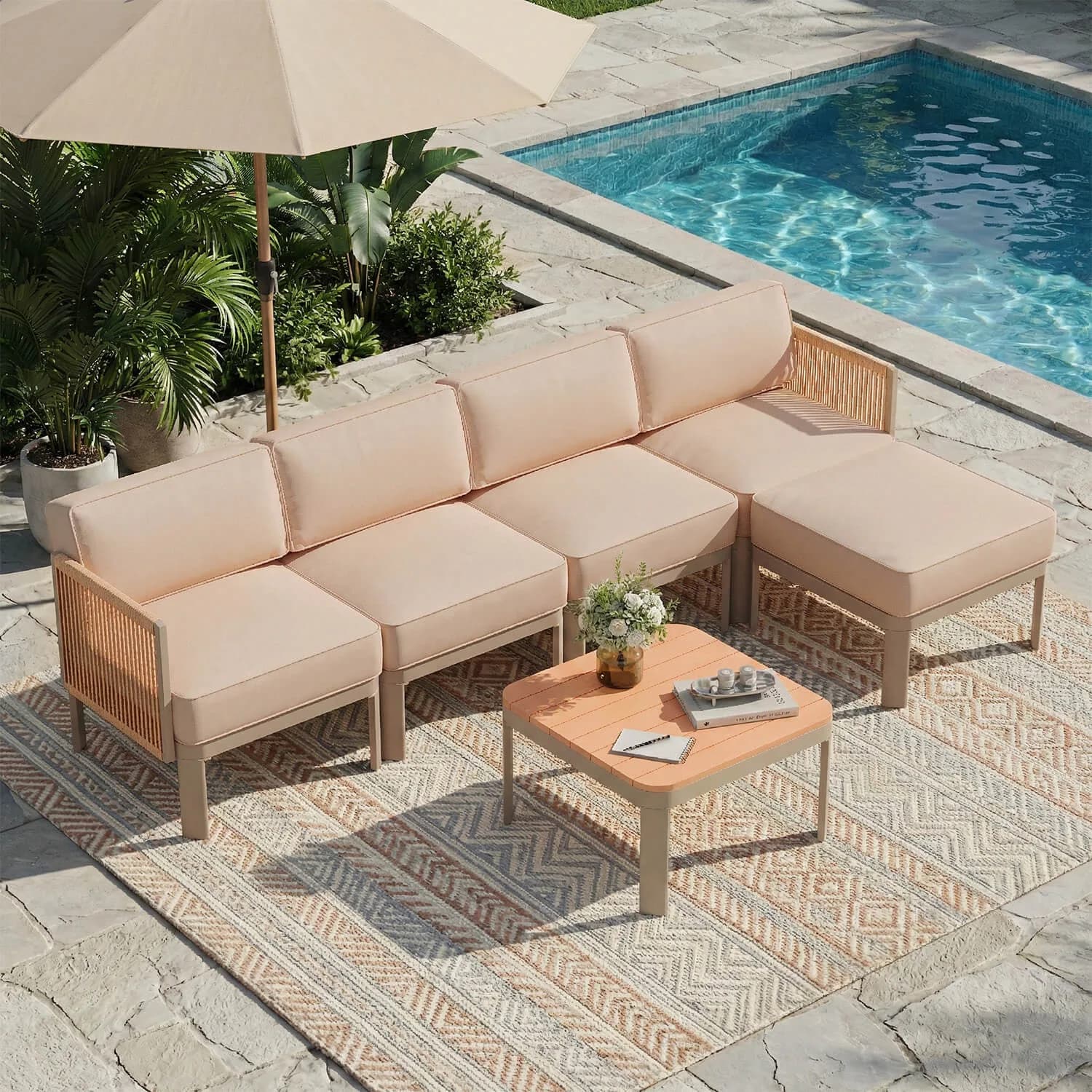 Beige six-piece aluminum outdoor sectional sofa set with coffee table